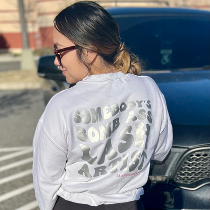 Somebody’s Bomb Ass Lash Artist Crewneck