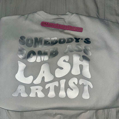 Somebody’s Bomb Ass Lash Artist Crewneck